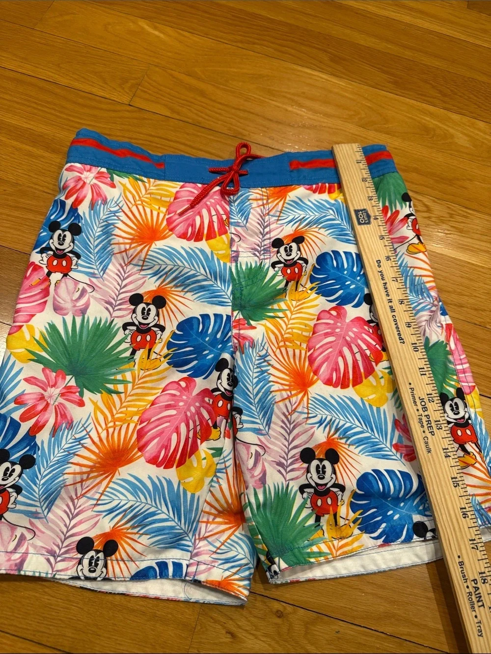 Disney store men’s swim shorts size small ,